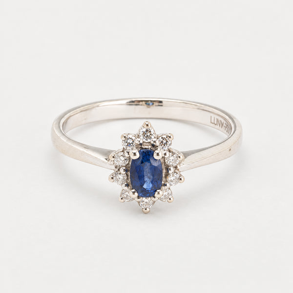Rosetring i 14K hvidguld med diamanter (0,09 ct) og blå sten, str 49