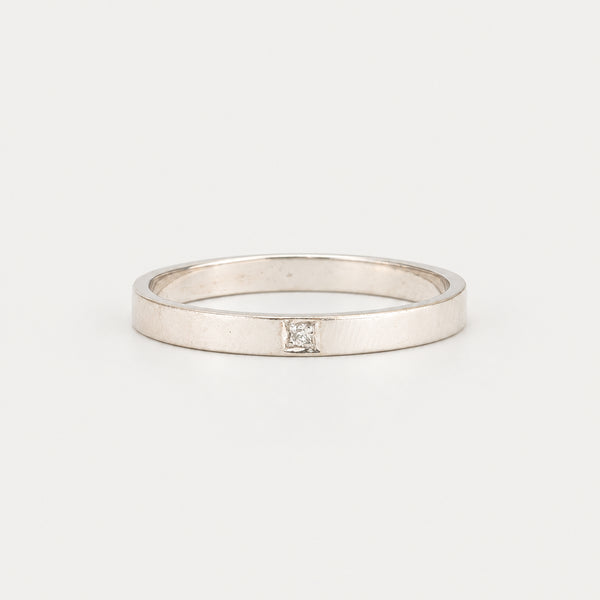 Alliancering i 18K hvidguld med en diamant (0,01 ct), str 56