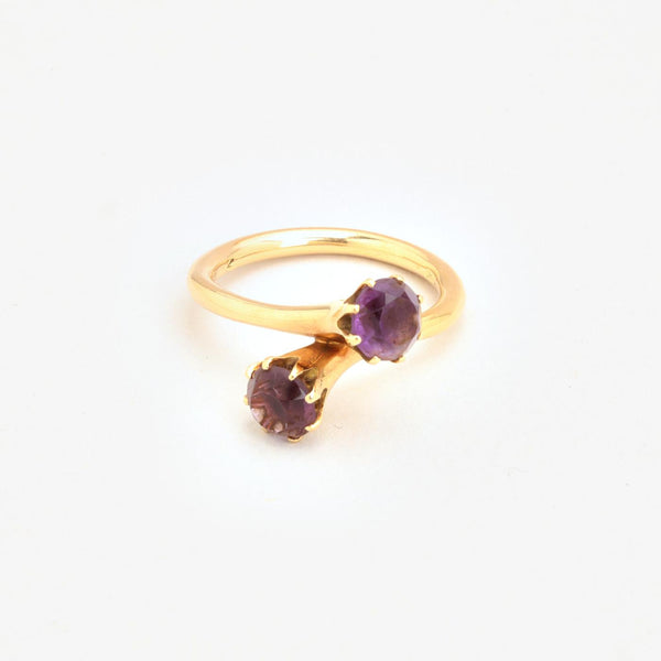 Toi et moi ring i 14K guld med lilla sten, str 55