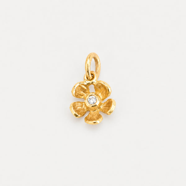 Blomster vedhæng i 18K guld med en diamant (0,02 ct), 1,3 cm, 0,93 g