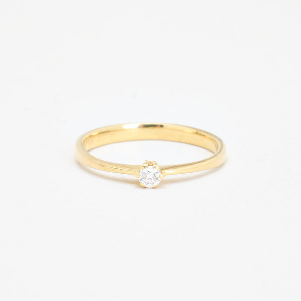 Solitairering i 14K guld med en diamant (0,06 ct), str 48, 1,04 g