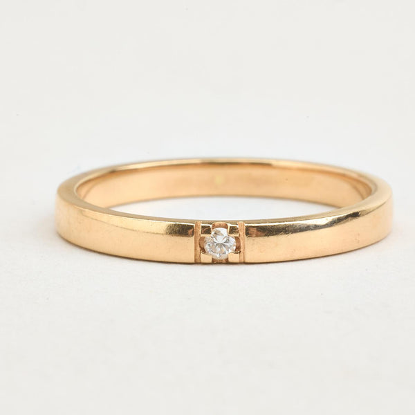 Alliancering i 14K guld med en diamant (0,01 ct), str 52