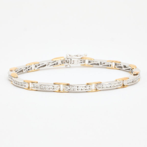 Tennisarmbånd i 14K guld og hvidguld med diamanter (0,76 ct), 18 cm, 11 g