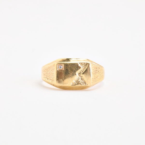 Organisk signetring i 14K guld med en diamant (0,01 ct), str 63
