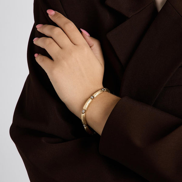 Armbånd i 14K guld med diamanter (0,21 ct), 18,5 cm