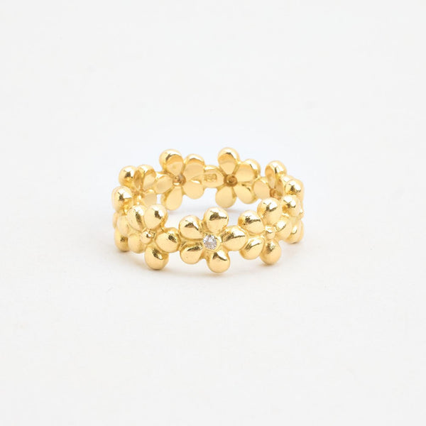Blomsterring i 18K guld med en diamant (0,02 ct), str 62