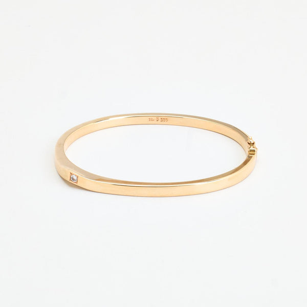 Armring i 14K guld med en diamant (0,04 ct), 6 cm, 10,83 g