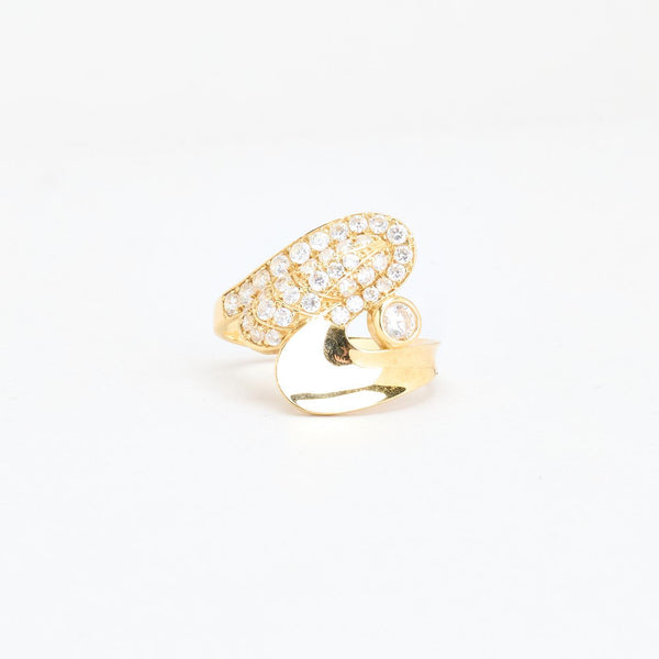 Pavé crossoverring i 14K guld med zirkoner, str 54