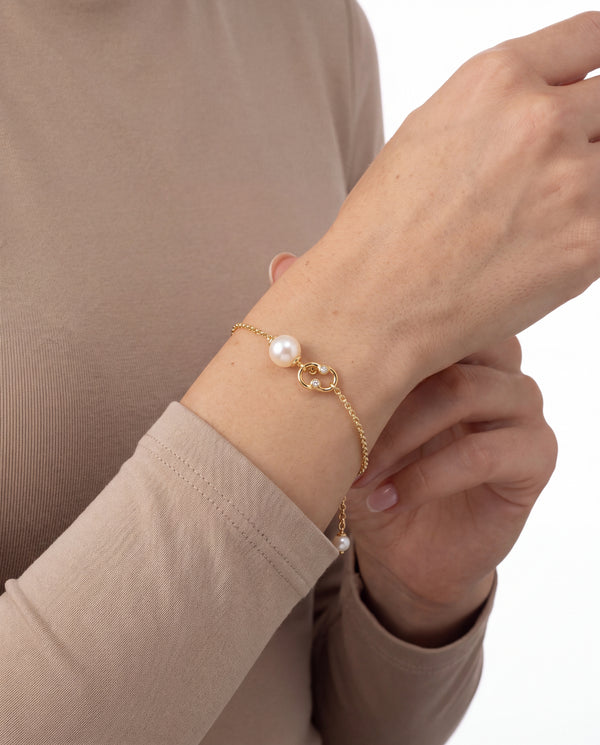 Georg Jensen Magic armbånd i 18K guld med diamanter (0.04 ct) og ferskvandsperler, 19 cm, 4,15 g