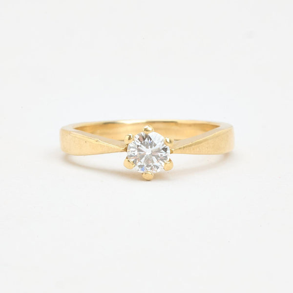Solitairering i 14K guld med en diamant (0,46 ct), str 48